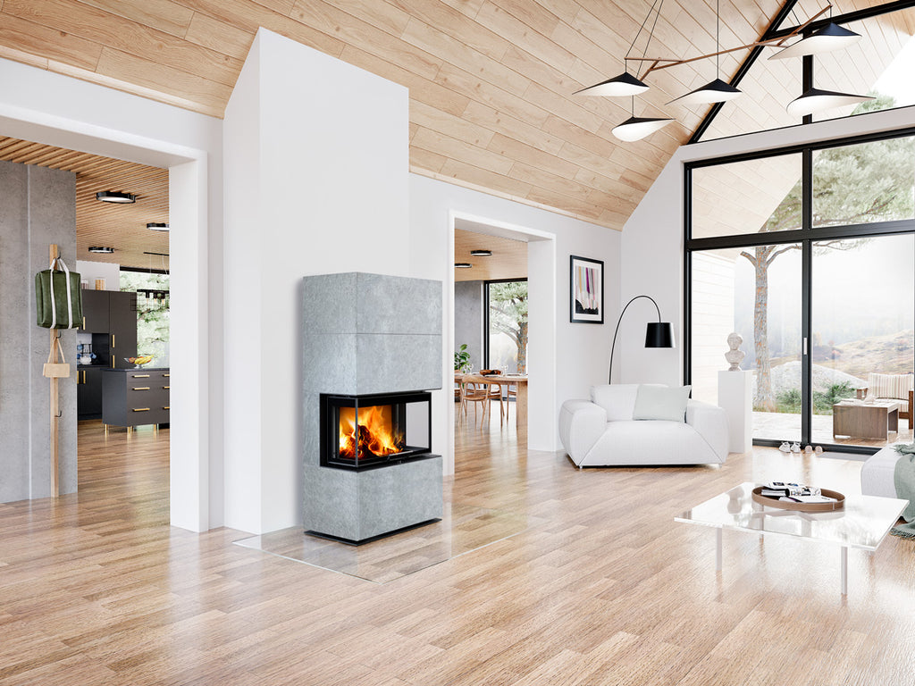 Semineu modular placat cu piatra serpentin gri, geam cu trei laturi instalat in living cabana la munte, design modern