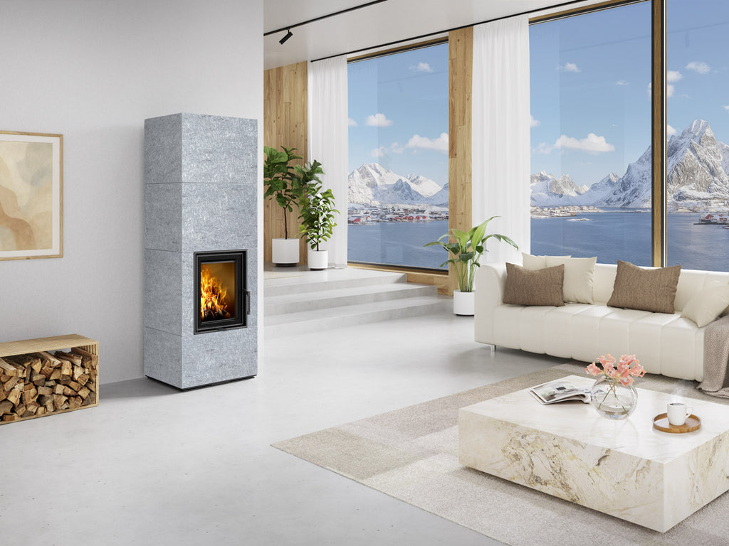 Semineu cu acumulare termica, placat cu piatra gri serpentin, geam drept, Nordac, instalat in casa de vacanta la munte cu design modern