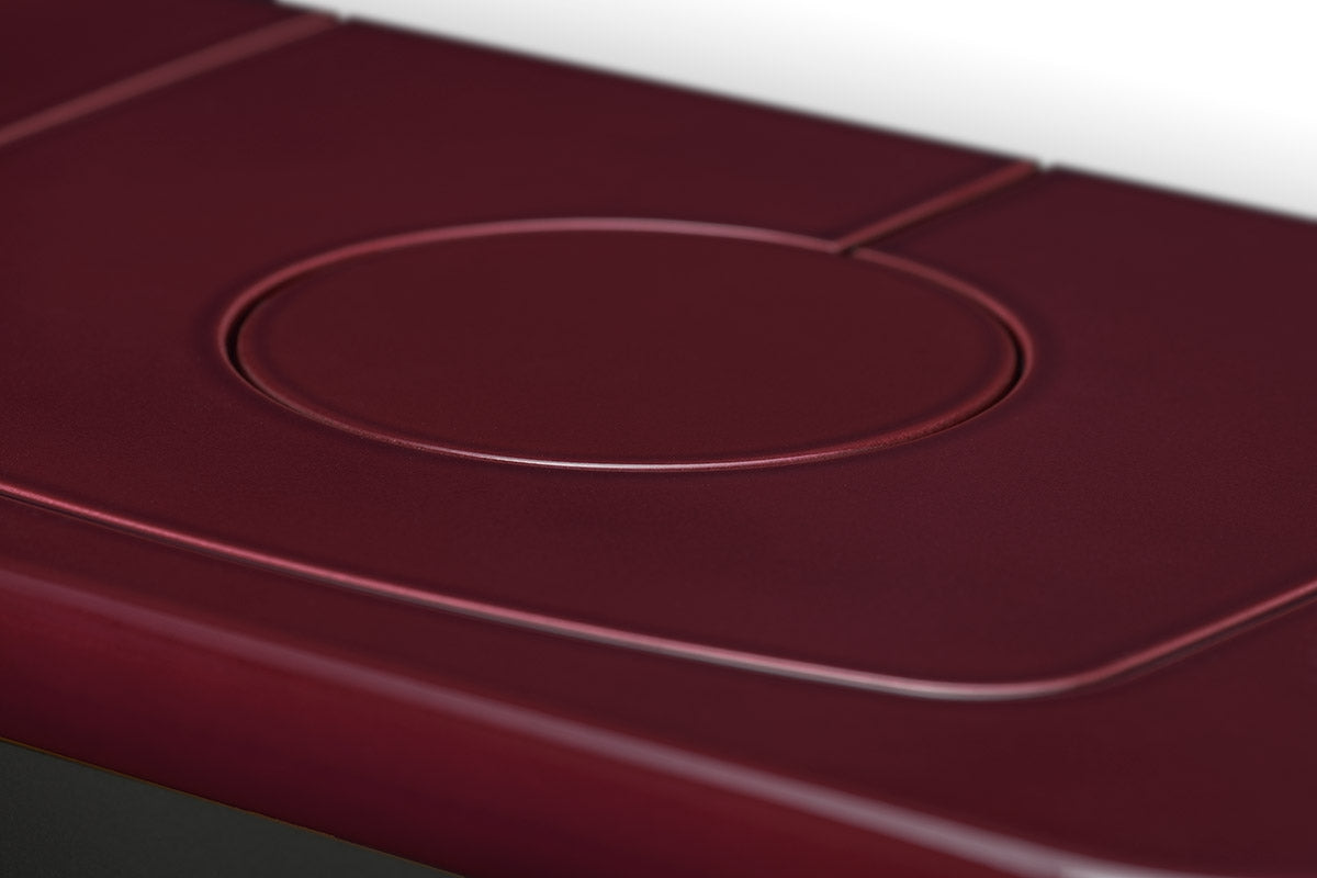 Soba lemne SIENA, suprafata superioara plana, culoare visinie. Finisaj lucios, cu un element oval incastrat si linii decorative.
